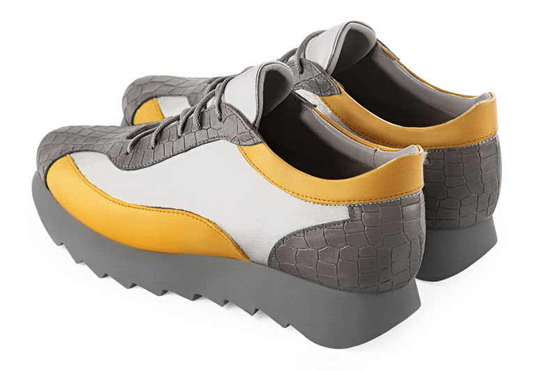 Ash grey, light silver and mustard yellow women's three-tone elegant sneakers. Round toe. Low rubber soles. Rear view - Florence KOOIJMAN